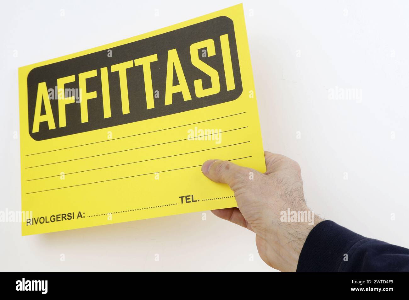 Sign Language For Rent Single word RENT on language sign in italian, man's hand holds placard ...