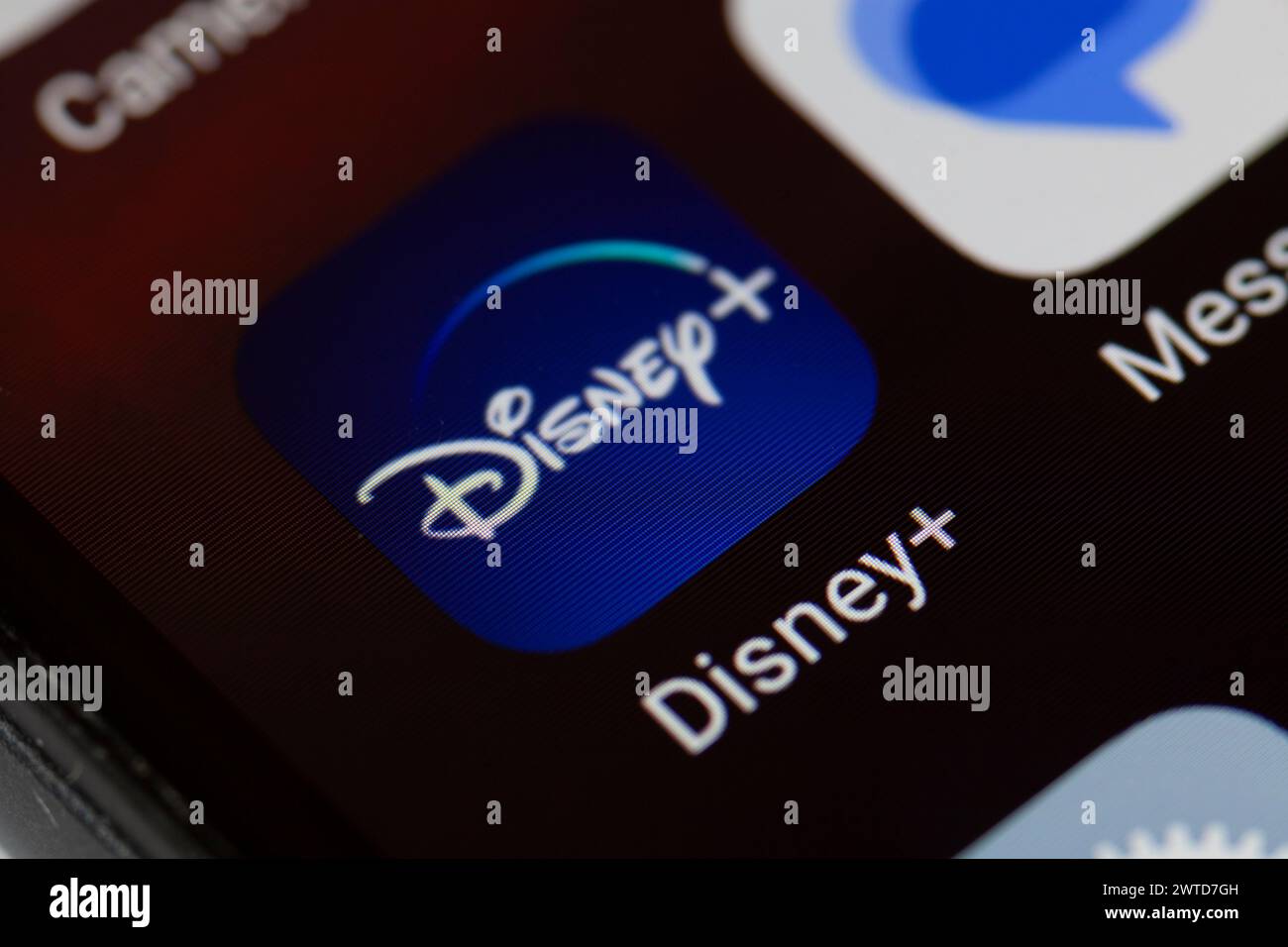 Disney+ app icon on mobile phone Stock Photo