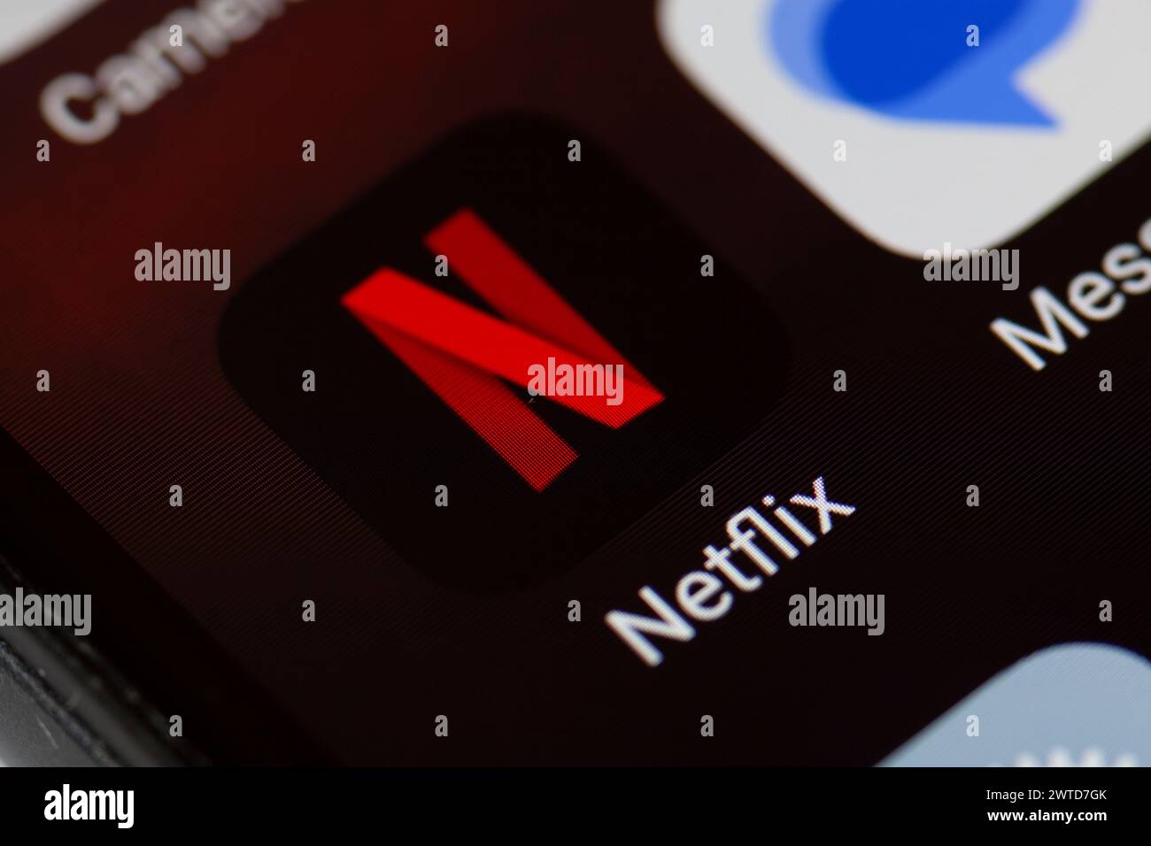 Netflix app icon on mobile phone Stock Photo