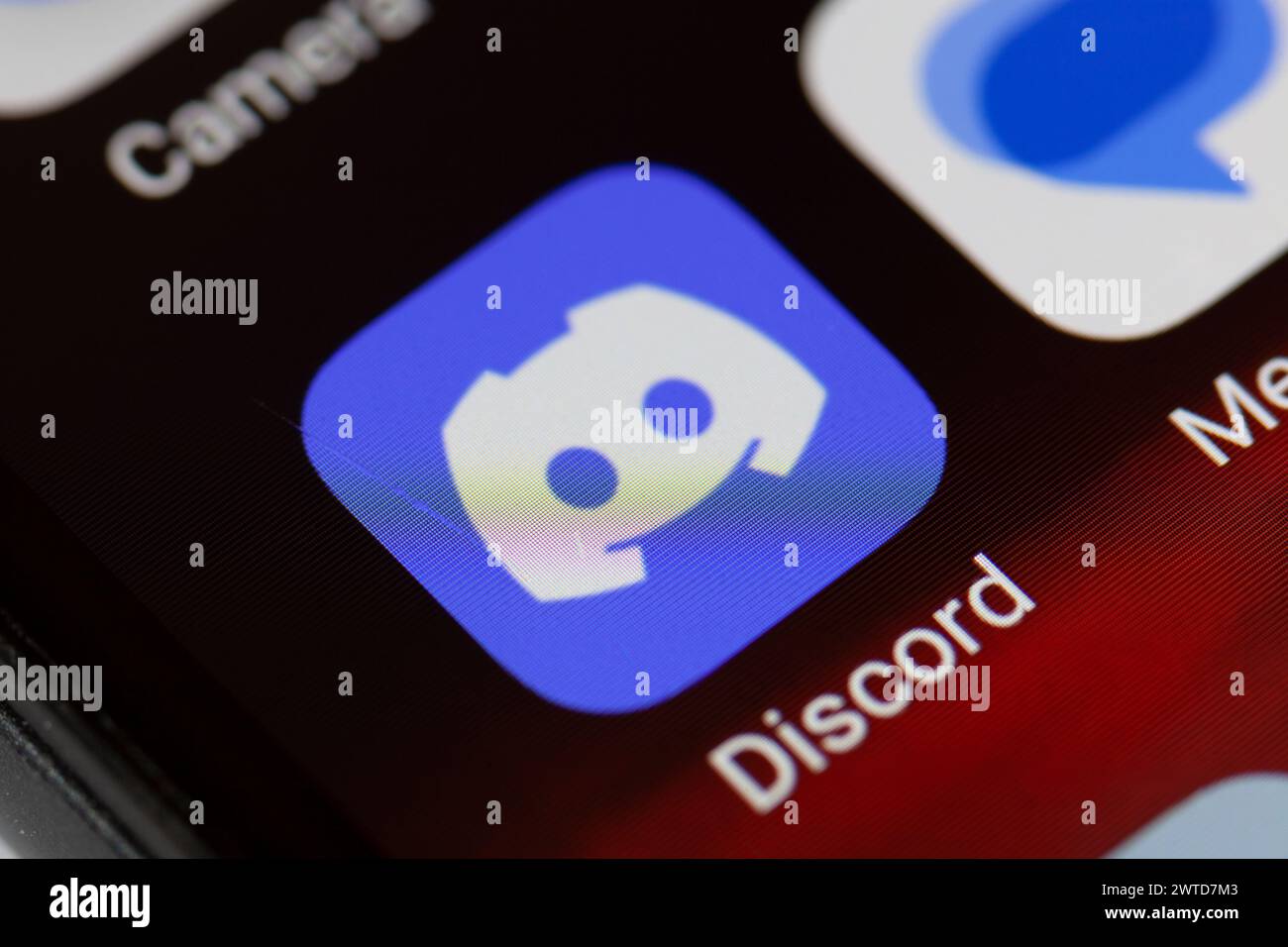 Discord app icon on mobile phone Stock Photo