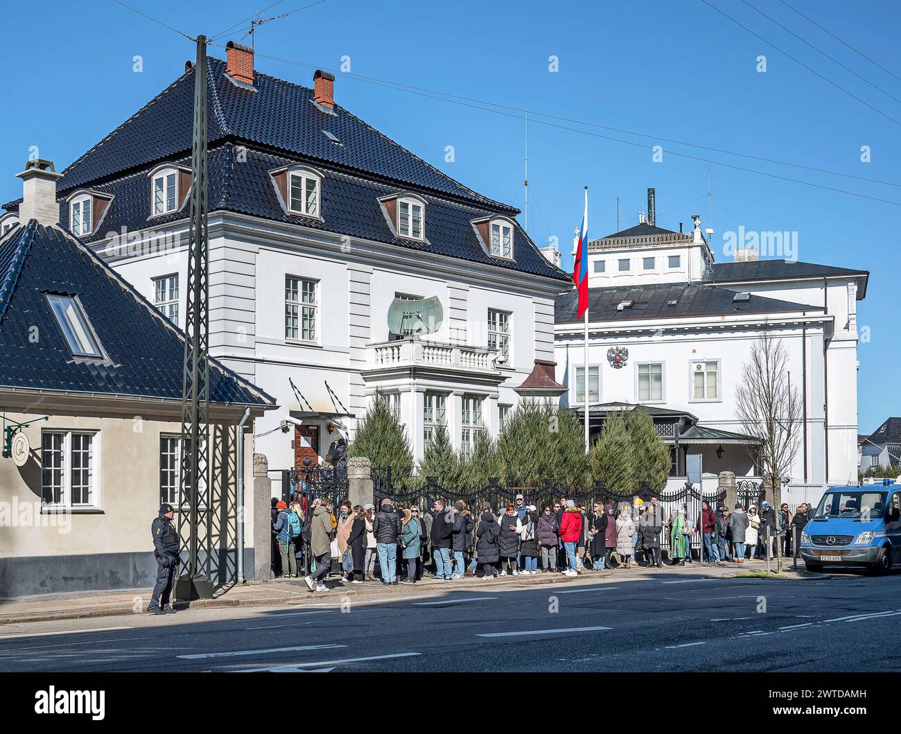 Copenhagen, Denmark, March 17, 2024. Noon Against Putin. People stand in a queue in front of the Russian Embassy to get in and vote on the presidential elections Credit: Stig Alenäs/Alamy Live News Stock Photo