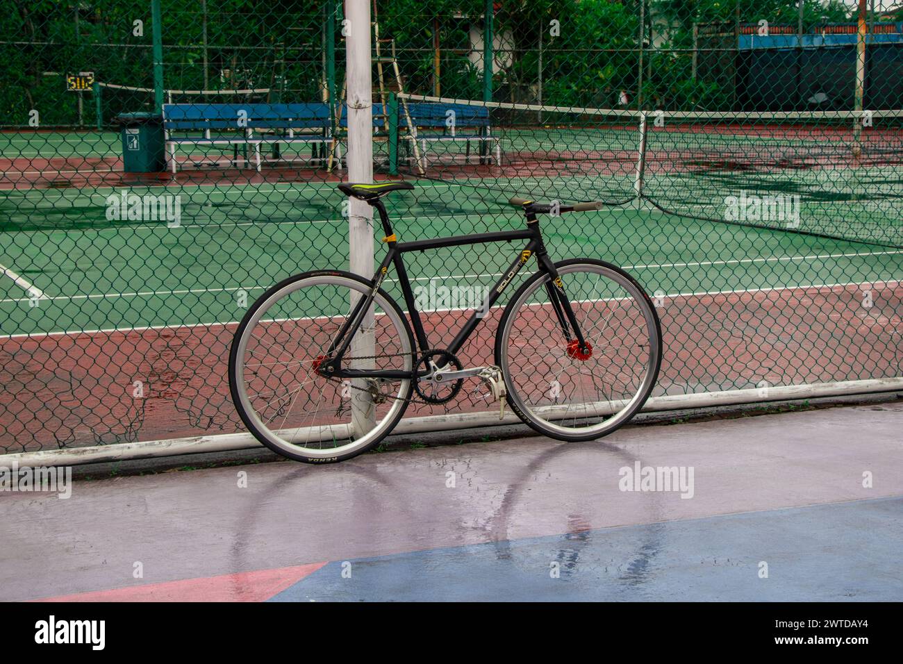 Fixed gear meets the hardwood hustle. ?? this is subculture sports Stock Photo