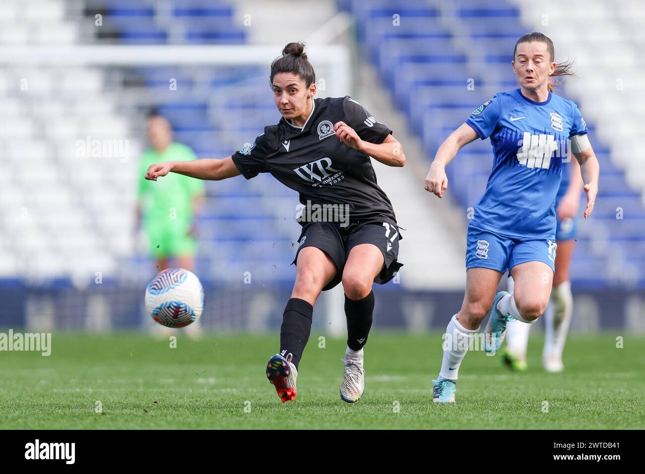 Birmingham, UK. 17th Mar, 2024. Blackburn Rovers' Millie Chandarana attempts to catch Birmingham City's Christie Harrison-Murray unawares to create a counter attack for her team during the Womens Championship match between Birmingham City Women and Blackburn Rovers Women at St Andrews, Birmingham, England on 17 March 2024. Photo by Stuart Leggett. Editorial use only, license required for commercial use. No use in betting, games or a single club/league/player publications. Credit: UK Sports Pics Ltd/Alamy Live News Stock Photo