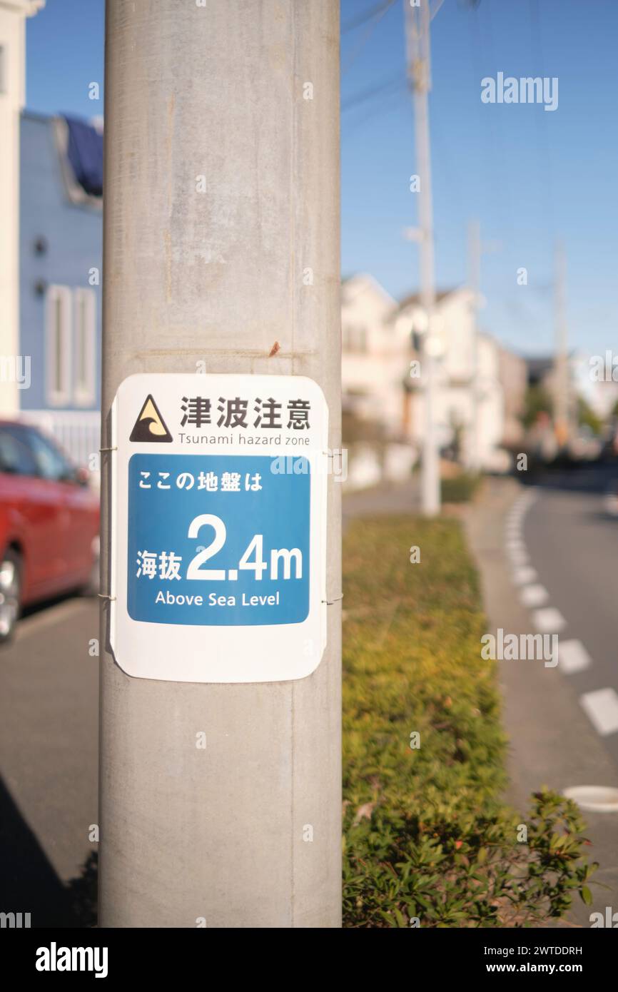 Tsunami hazard zone sign, indicating that this area is 2,4 meter above ...