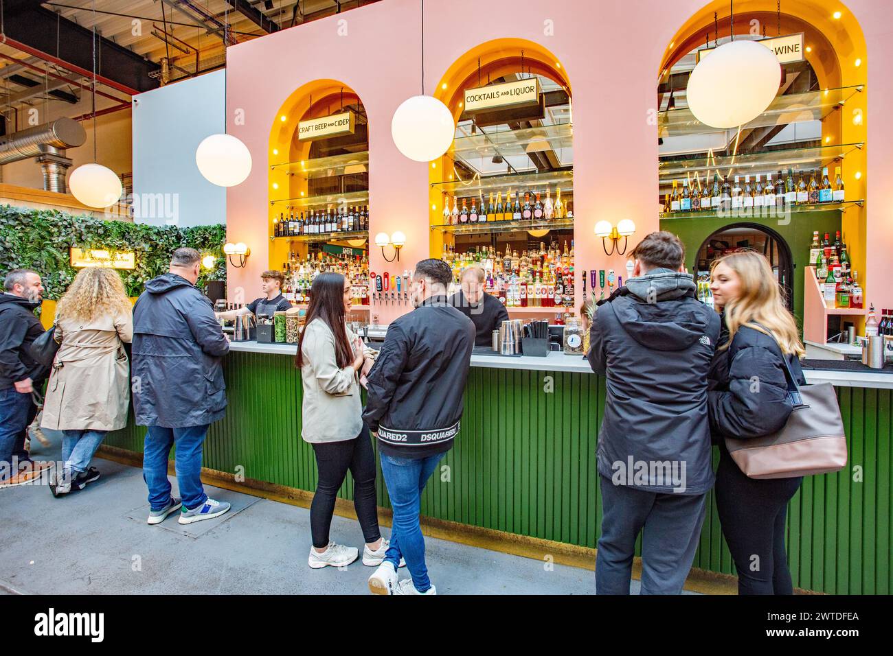 People eating and drinking in Chester Market  food  hall outlet Stock Photo