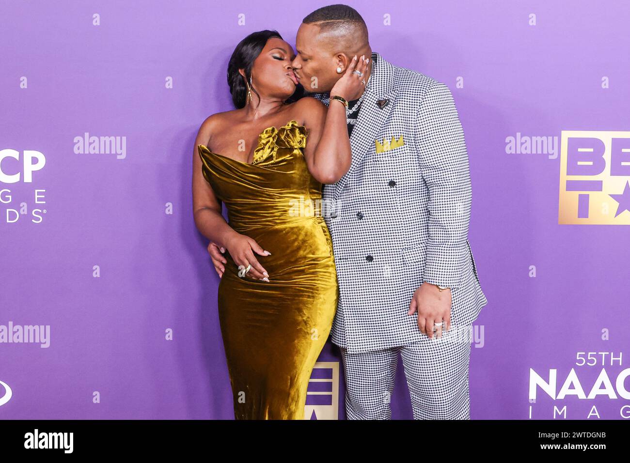 LOS ANGELES, CALIFORNIA, USA MARCH 16 Naturi Naughton and husband(02)