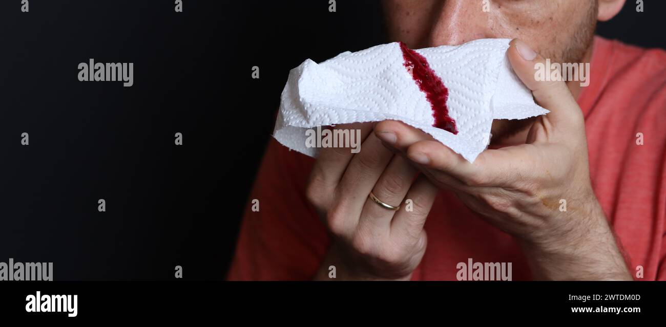 Man sneezing with handkerchief in hand hi-res stock photography and ...
