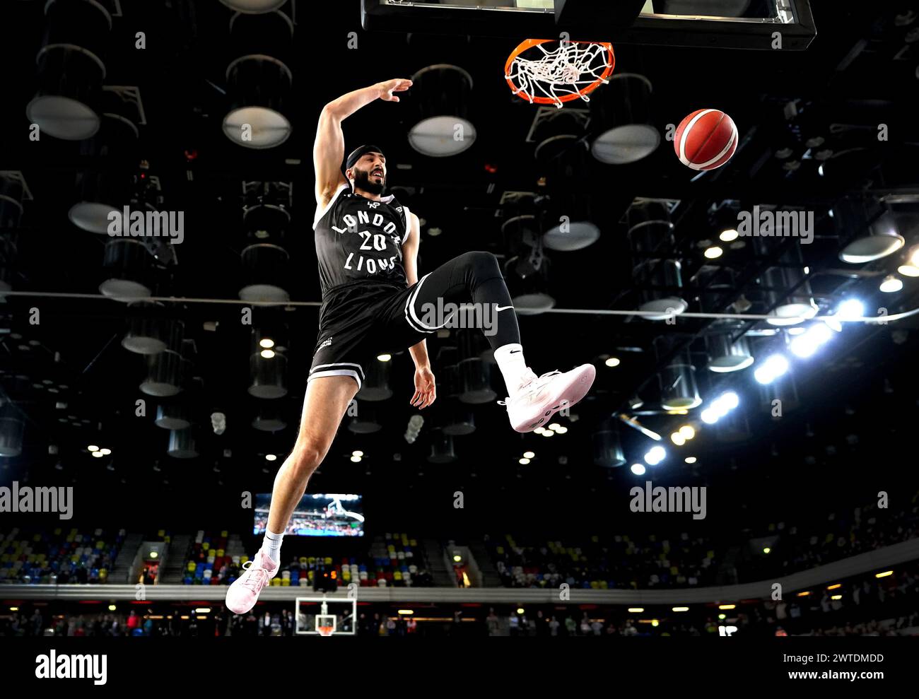 Josh Sharma in action during the dunk contest before the Men's British Basketball League All-Stars match at the Copperbox Arena, London. Picture date: Sunday March 17, 2024. Stock Photo