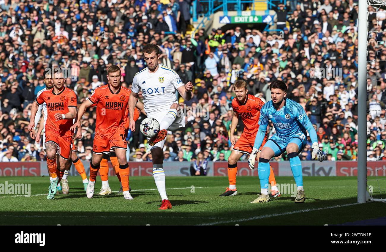 Elland Road, Leeds, Yorkshire, UK. 17th Mar, 2024. EFL Championship Football, Leeds United versus Millwall; Leeds United's Patrick Bamford controls the ball with Millwall's Matija Sarkic and Zian Flemming close by Credit: Action Plus Sports/Alamy Live News Stock Photo