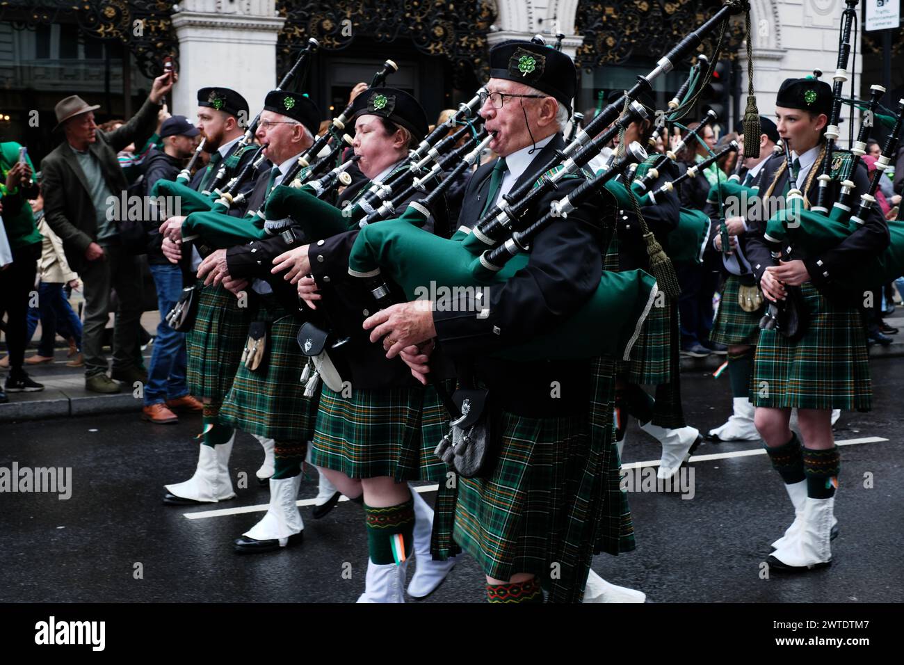 London, United Kingdom. 17th Mar, 2024. Irish players play bagpipes