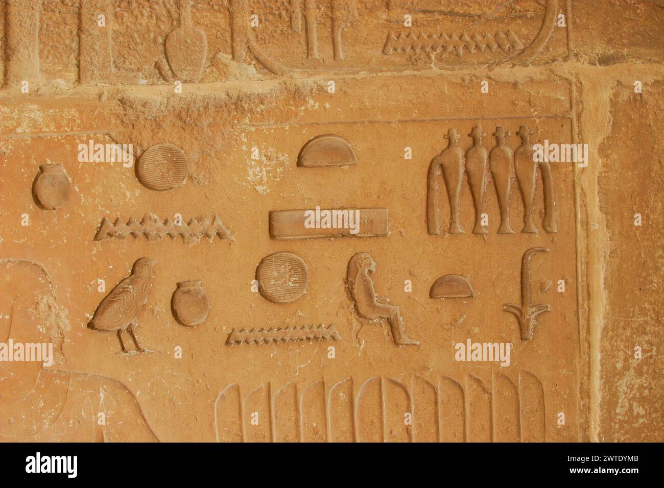 Egypt, Saqqara, near Unas causeway, ruins of the Khenu mastaba : Text with his name. Stock Photo