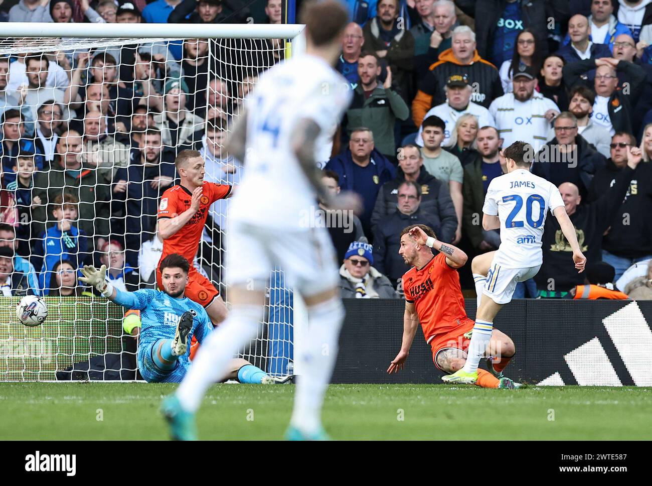 Elland Road, Leeds, Yorkshire, UK. 17th Mar, 2024. EFL Championship Football, Leeds United versus Millwall; Leeds United's Daniel James scores his side's second goal in the 79th minute to make the score 2-0 beating Millwall's Matija Sarkic Credit: Action Plus Sports/Alamy Live News Stock Photo