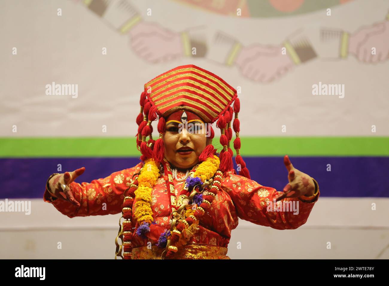 A Nepali dance artist is performing the traditional Kumari Dance during ...