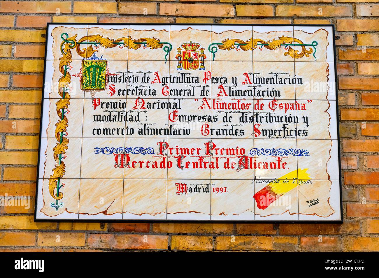 Information plaque made with tiles in Central Market, Alicante, Spain Stock Photo