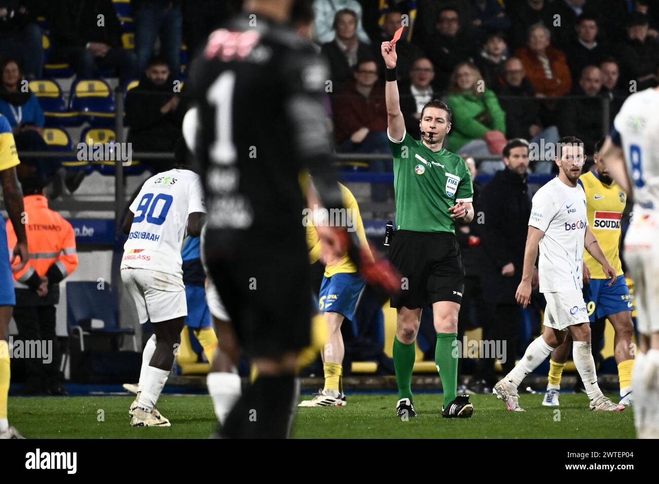 Westerlo, Belgium . 17th Mar, 2024. referee Lawrence Visser gives ...