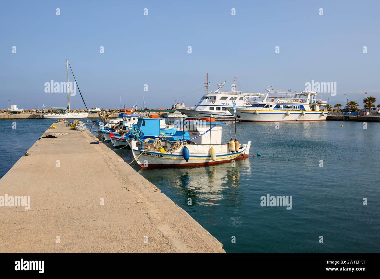 Kos, Greece - May 12, 2023: Boats moored in the port of Kardamena. Kos island, Greece Stock Photo