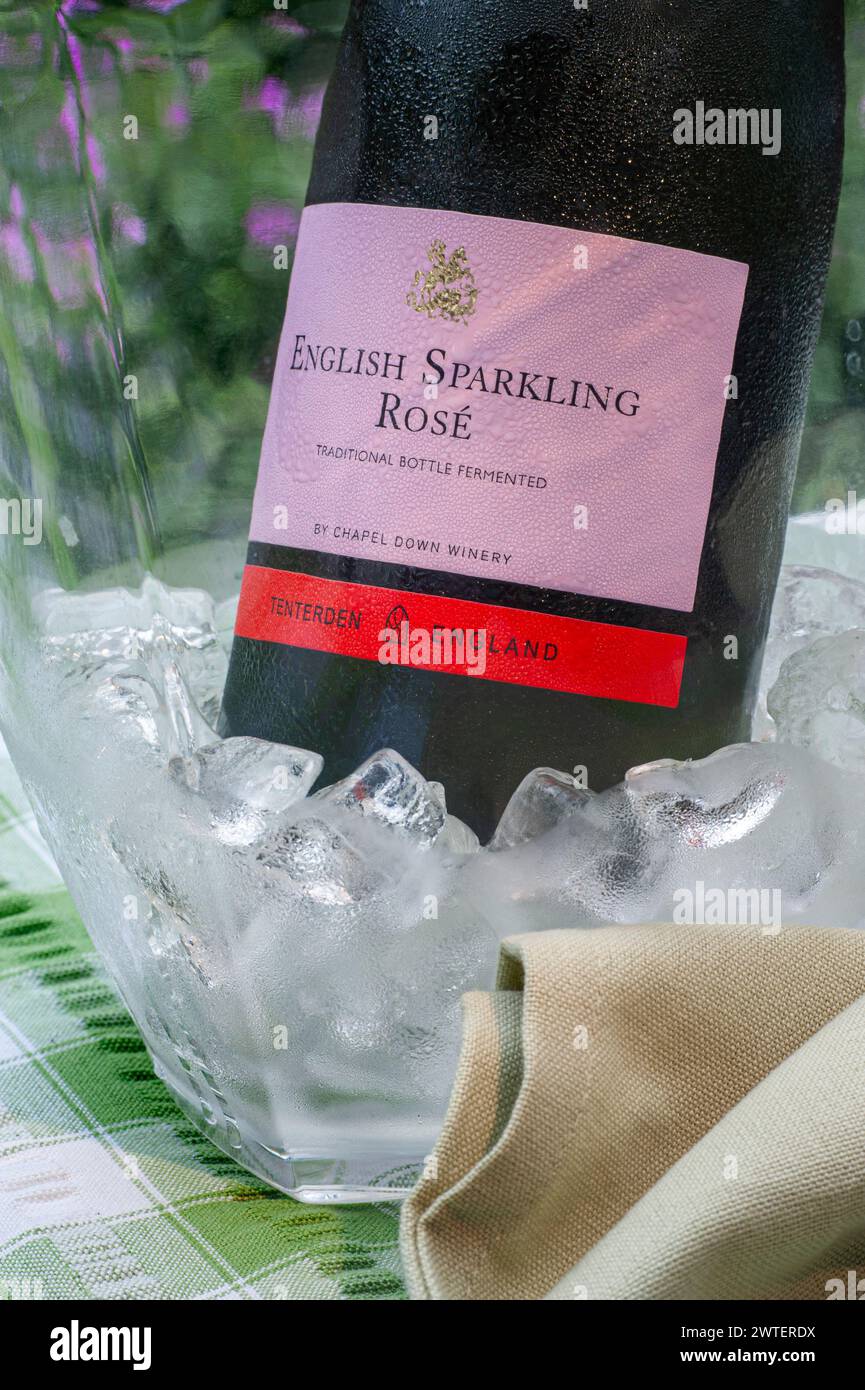 English Sparkling Rosé wine bottle and label in iced wine chiller on