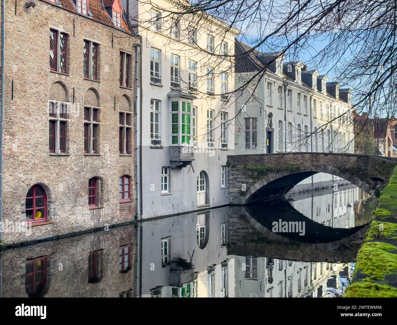 Beautiful Canal And Traditional Houses In The Old Town Of Bruges 