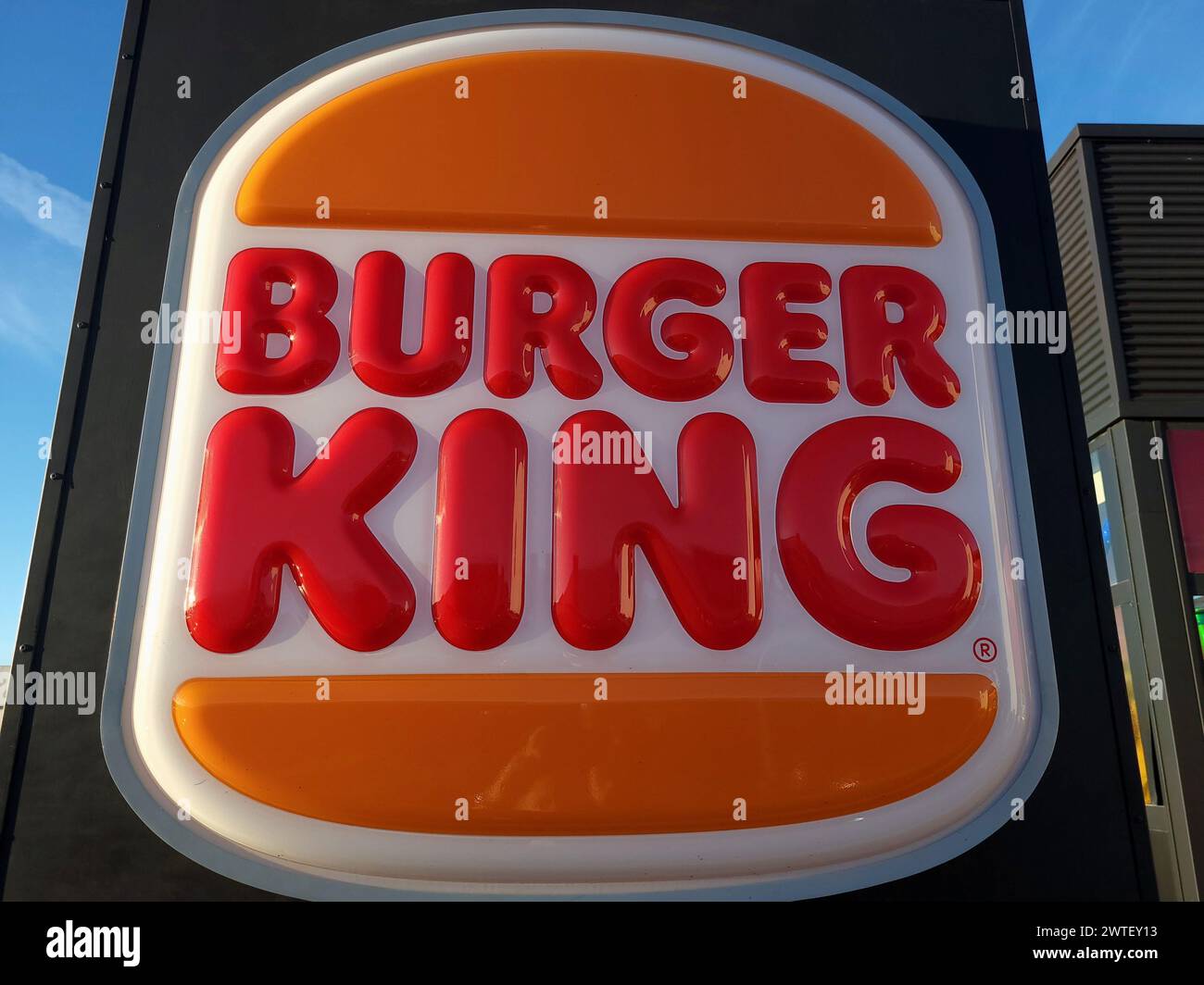 Close-up of the logo of the multinational fast food company Burguer. King. Stock Photo