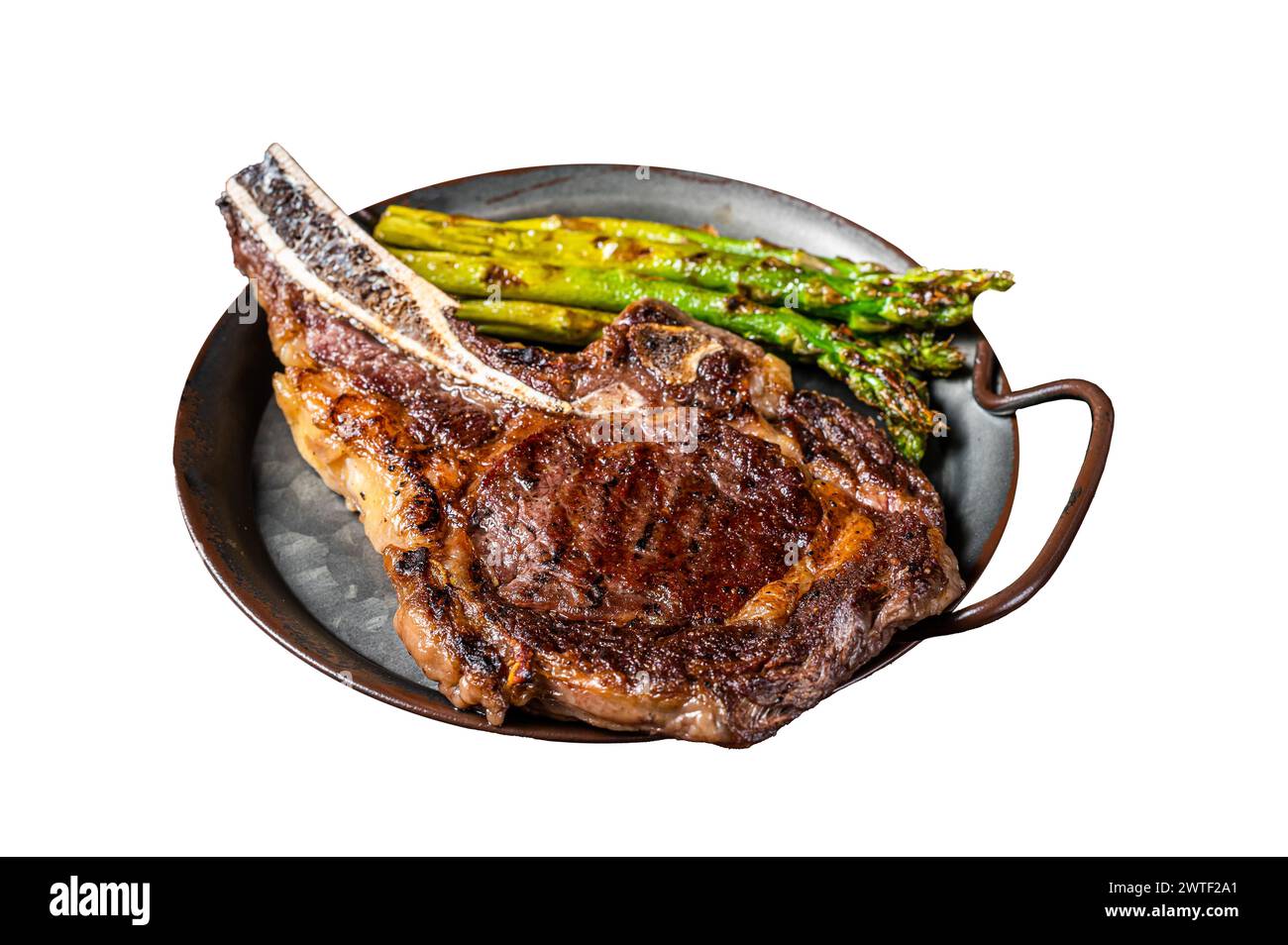 BBQ Grilled Tomahawk or Cowboy with bone beef steak, roasted asparagus. Isolated on white background. Top view Stock Photo