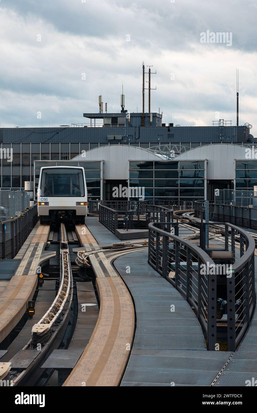 Frankfurt Airport, Germany February 19, 2024 the SkyLine Train on the track between the