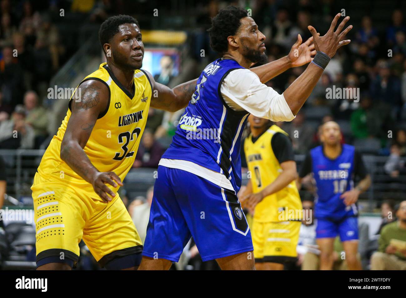 London, Canada. 17th Mar, 2024. London Ontario Canada. March 17 2024, The London Lightning defeat the Kitchener Titans 118-114 in regulation on St. Patrick's Day. Drew Gordon (32) of London Lightning guarding Jaquan Lightfoot (5) of Kitchener Titans. Credit: Luke Durda/Alamy Live News Stock Photo