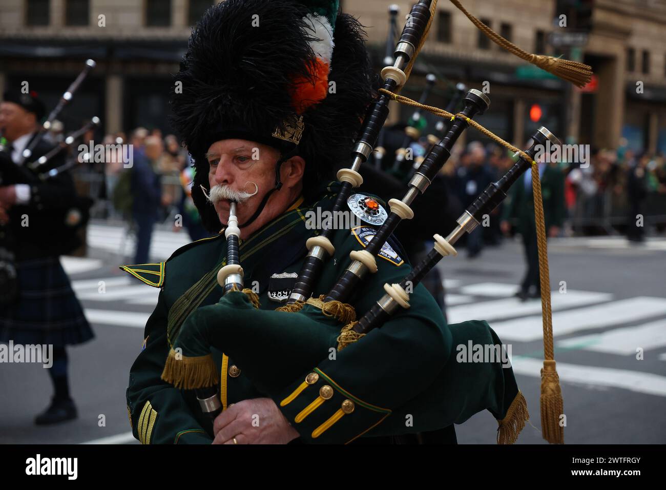 The New York City Police Department Emerald Society Band march in the ...