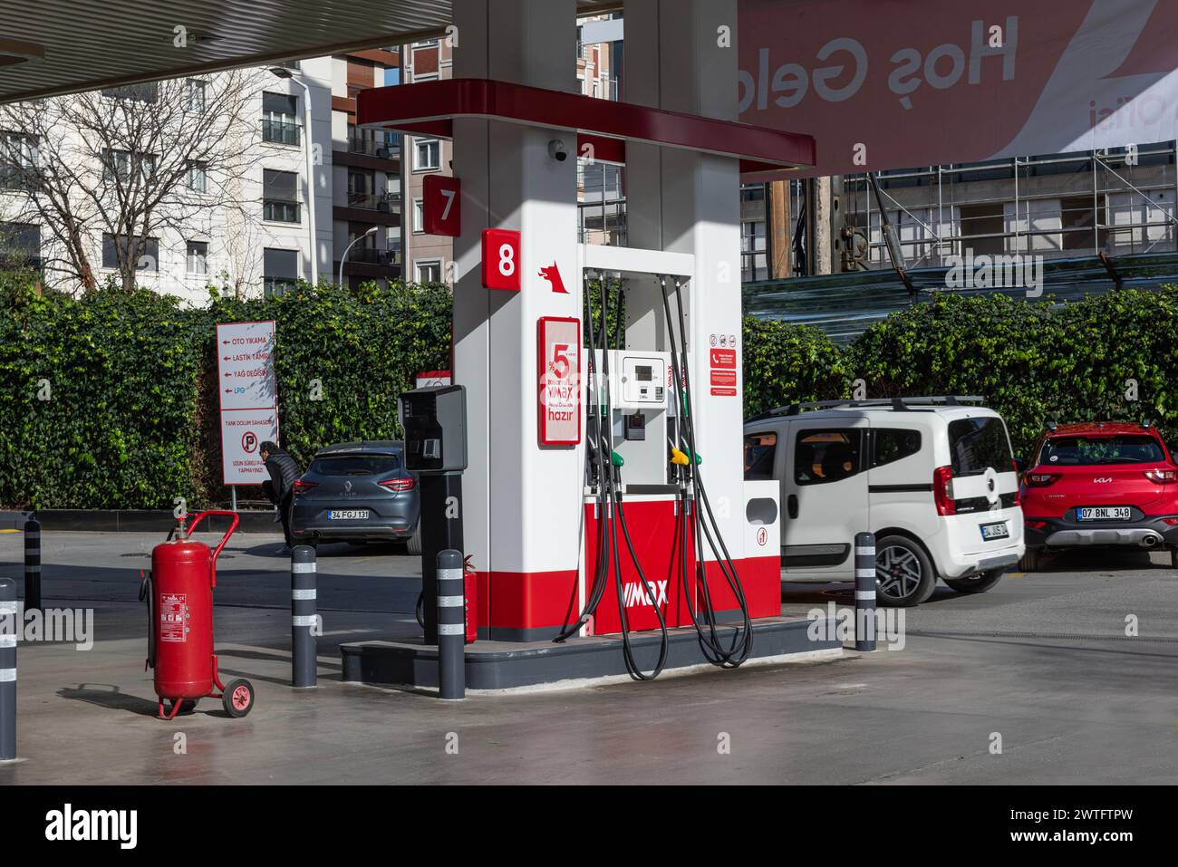 ISTANBUL, TURKEY - MARCH 12, 2024: Red petrol station of the Ofisi company is in center of city. The Petrol Ofisi is a fuel products distribution and Stock Photo