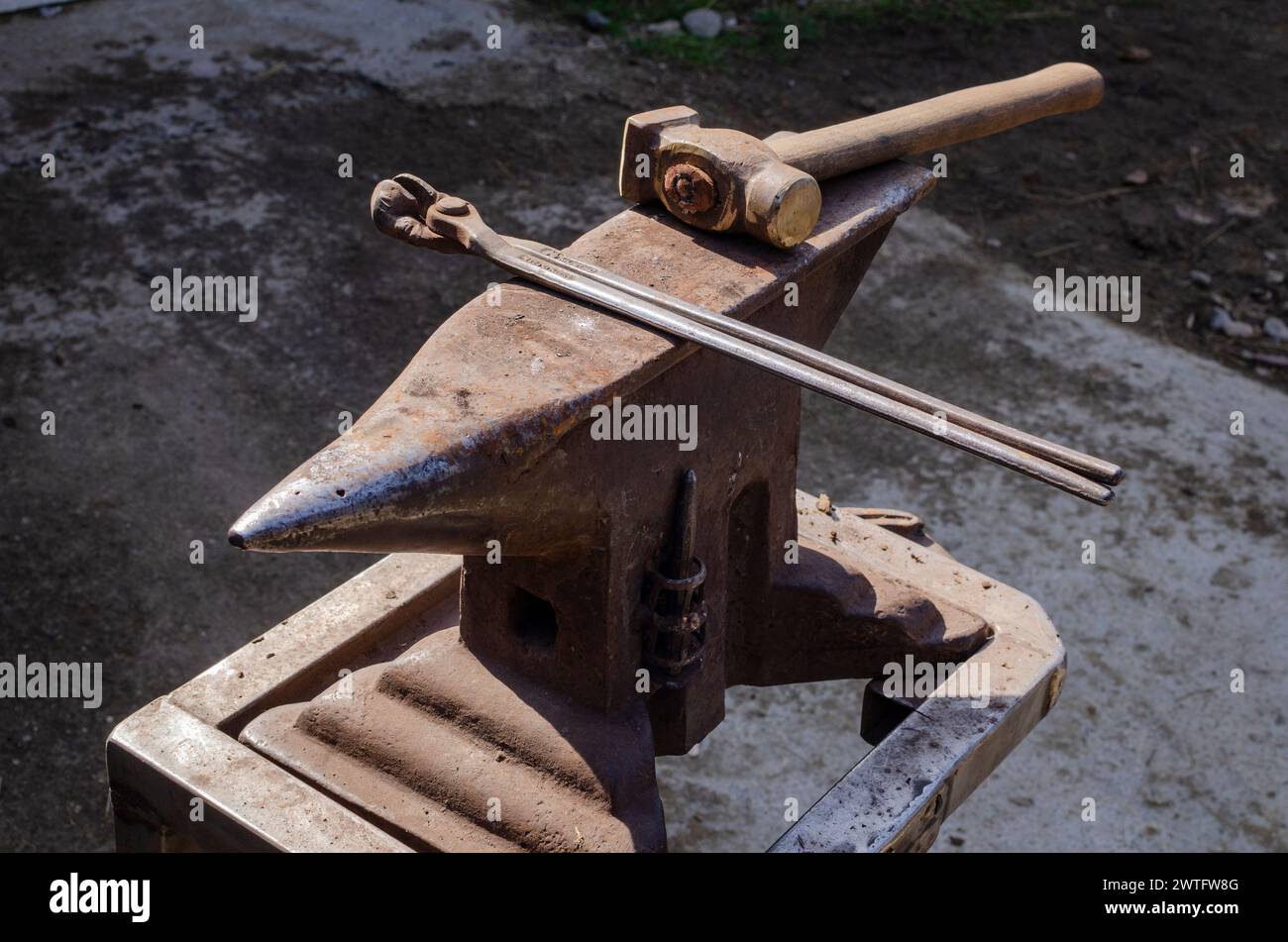 the blacksmith's anvil and tools, iron work, horseshoes, file pliers, hand tools Stock Photo
