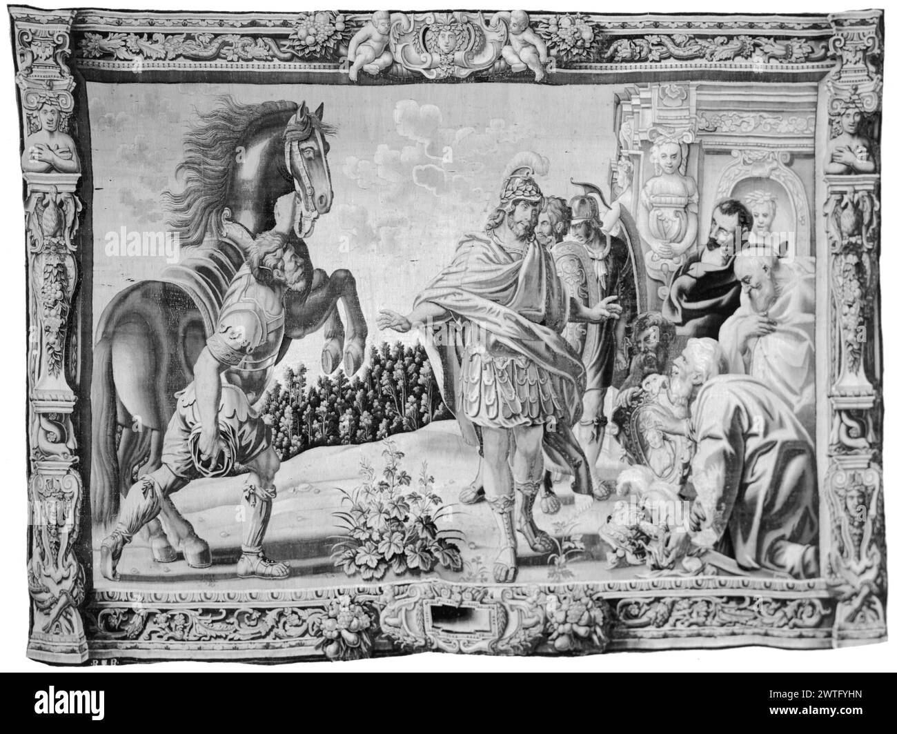 Alexander presented with arms and adored as god by his people. Jordaens, Jacob (Flemish, 1593-1678) (cartoon creator) [painter] c. 1640 Tapestry Dimensions: H 13'3' x W 17'2' Tapestry Materials/Techniques: unknown Culture: Flemish Weaving Center: Brussels Ownership History: French & Co. Inscriptions: City mark on lower guard, left 4 men offer sword, helmet & portrait medallion to Alexander (R, foreground); Alexander wears plumed helmet & has arms out-stretched (center, foreground); Alexander's attendant holds reins of rearing Bucephalus, Alexander's horse (L, foreground); 2 soldiers wait nearb Stock Photo