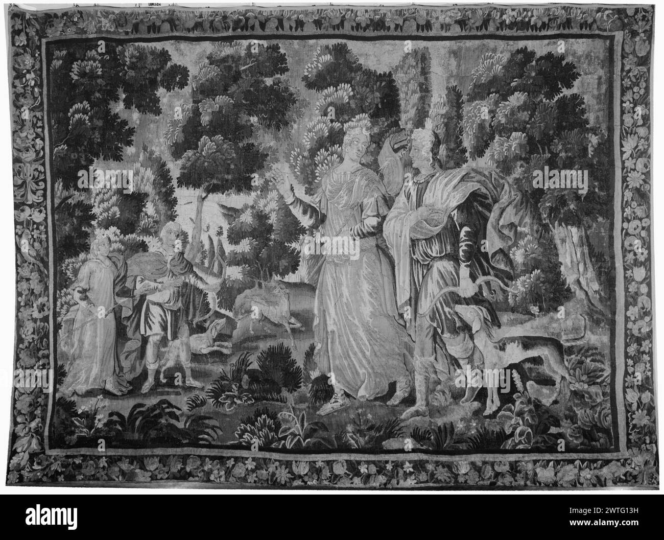 Diana and Apollo hunting deer. unknown c. 1680-1700 Tapestry Dimensions: H 8'4' x W 11'5' Tapestry Materials/Techniques: unknown Culture: French Weaving Center: Aubusson Ownership History: French & Co. received from Mrs. J. Larus, 8/6/1952; returned 4/23/1954. In landscape with trees & flowering plants, Diana & Apollo standing with arrow & bow, near dog in foreground; additional couple with similar weapons in background (L) near dog running after deer (BRD) floral garland (L BRD) inhabited by bird & with acanthus leaves French & Co. stock sheet in archive, 52489-x Stock Photo