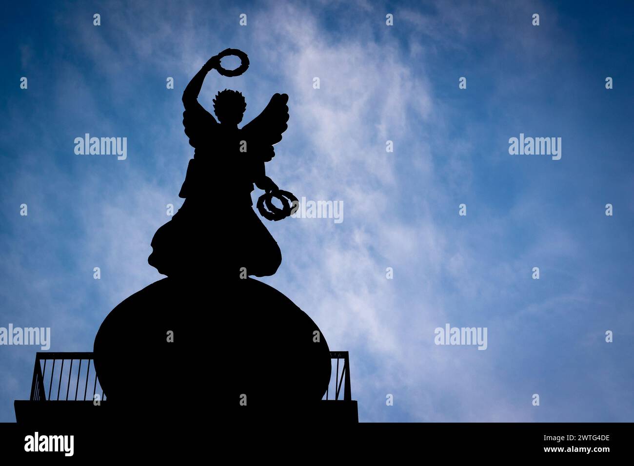 Hanover, Germany. 17th Mar, 2024. The Victoria on the Waterloo Column in the Calenberger Neustadt district can be seen as a silhouette against the light. Credit: Moritz Frankenberg/dpa/Alamy Live News Stock Photo