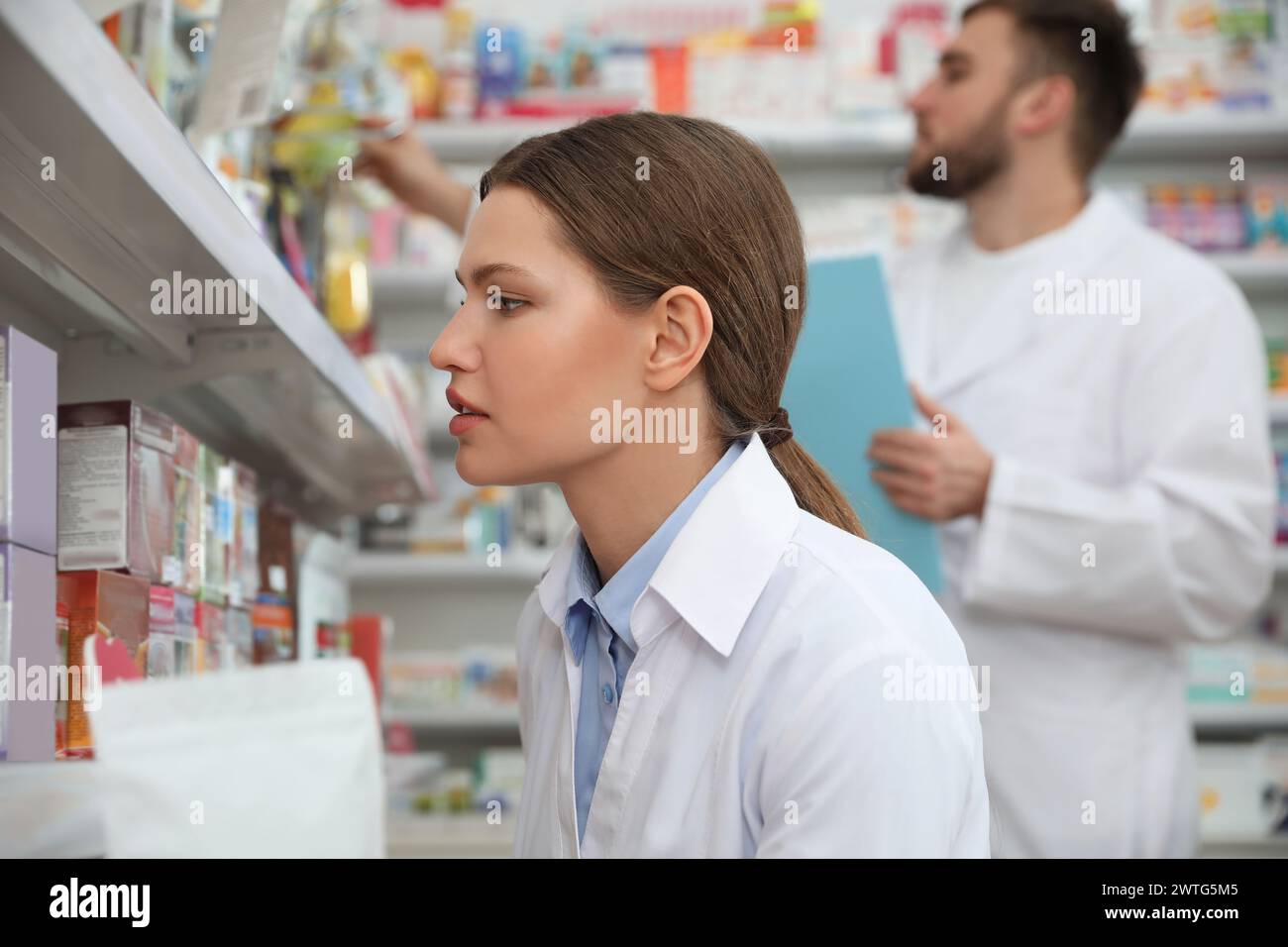 Team pharmacist chemist woman hi-res stock photography and images - Alamy