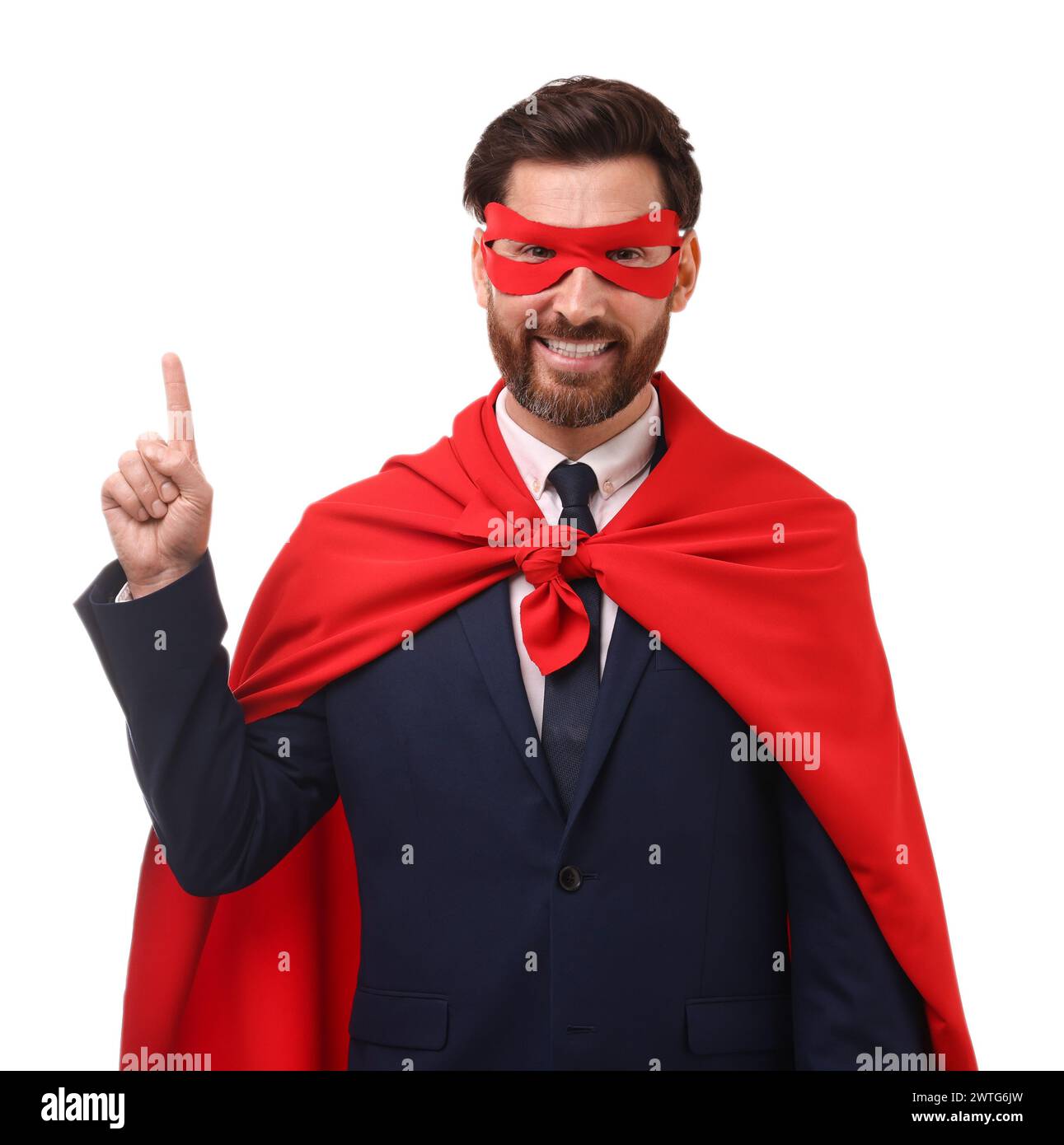 Happy businessman wearing red superhero cape and mask on white ...