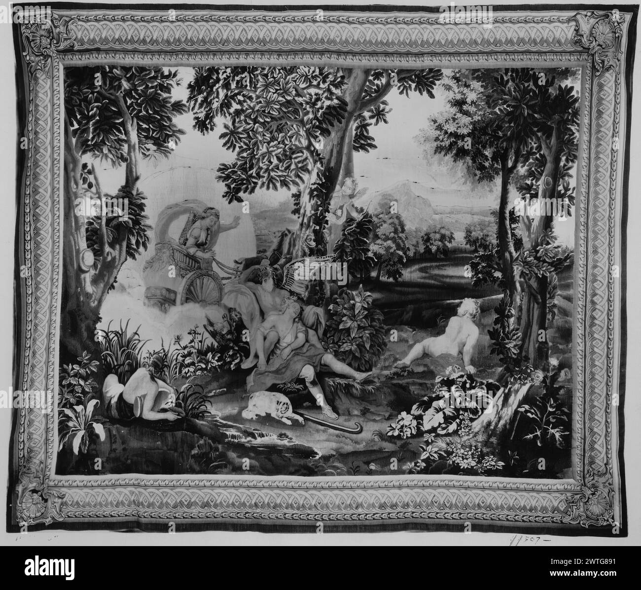 Diana (Artemis) and Endymion. Houasse, René-Antoine (French, 1645-1710) (designed after, attr.) [painter] c. 1700-1720 Tapestry Dimensions: H 10'1' x W 10'9' Tapestry Materials/Techniques: unknown Culture: French Weaving Center: Paris Ownership History: French & Co.?. C. John coll., London. United States, New York, New York, Sotheby's, November 29, 1980, lot 451. Diana, in the guise of Luna (Selene), rides in chariot near Endymion, who sleeps in the arms of Hypnos (Somnus); in landscape setting (BRD) picture-frame border with interlaced rosetted strapwork, shell cartouche in corners No French Stock Photo