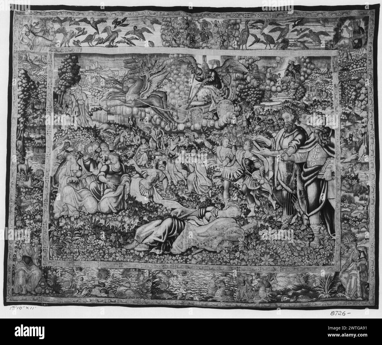 Triumph of Time over Fame. unknown c. 1590-1610 Tapestry Dimensions: H 11' x W 13'10' Tapestry Materials/Techniques: unknown Culture: Flemish Weaving Center: Brussels Ownership History: French & Co. Inscriptions: City mark on lower guard, left Figure of Time as old man with crutches in chariot driven by mythical creatures [like winged reindeer] (top), various figures surround Fame (?) who lies on ground (center, foreground), cityscape (background) (BRD) vignette scenes of figures in landscapes with many animals (various birds, camels, deer, various sea animals, some mythological), framed by 2 Stock Photo