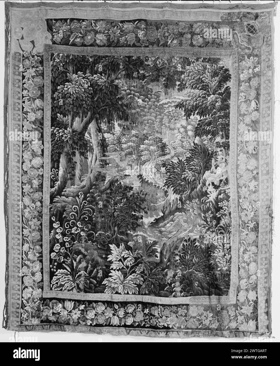 Landscape with hunter, dog and gentleman. unknown c. 1680-1700 Tapestry Dimensions: H 8'6' x W 7' Tapestry Materials/Techniques: unknown Culture: Flemish Weaving Center: unknown Ownership History: French & Co. purchased from Mrs. Howard Remig, received 5/13/1965; sold to Mrs. Klaus Reichenheim 9/23/1946. Stock Photo