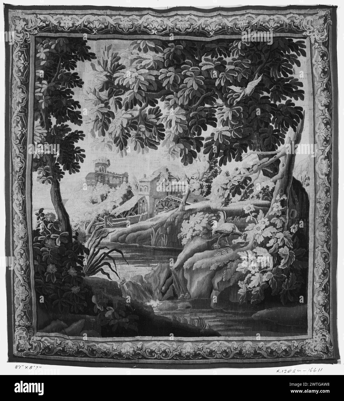 River landscape with watermill. unknown c. 1720-1760 Tapestry Dimensions: H 8'7' x W 8'1' Tapestry Materials/Techniques: unknown Culture: French Weaving Center: Aubusson Ownership History: French & Co. purchased from Dr. P. [Preston] P. [Pope] Satterwhite, invoiced 6/26/1929; sold to Rivas Eyzaguirre 3/12/1953. Fowl with other bird (R) near rocky waterfall, amongst flowering plants & trees; river in center leading to watermill with wheel & additional building on higher ground in distance (BRD) picture-frame border with continuous, scrolling brackets & acanthus leaves enclosing further acanthus Stock Photo