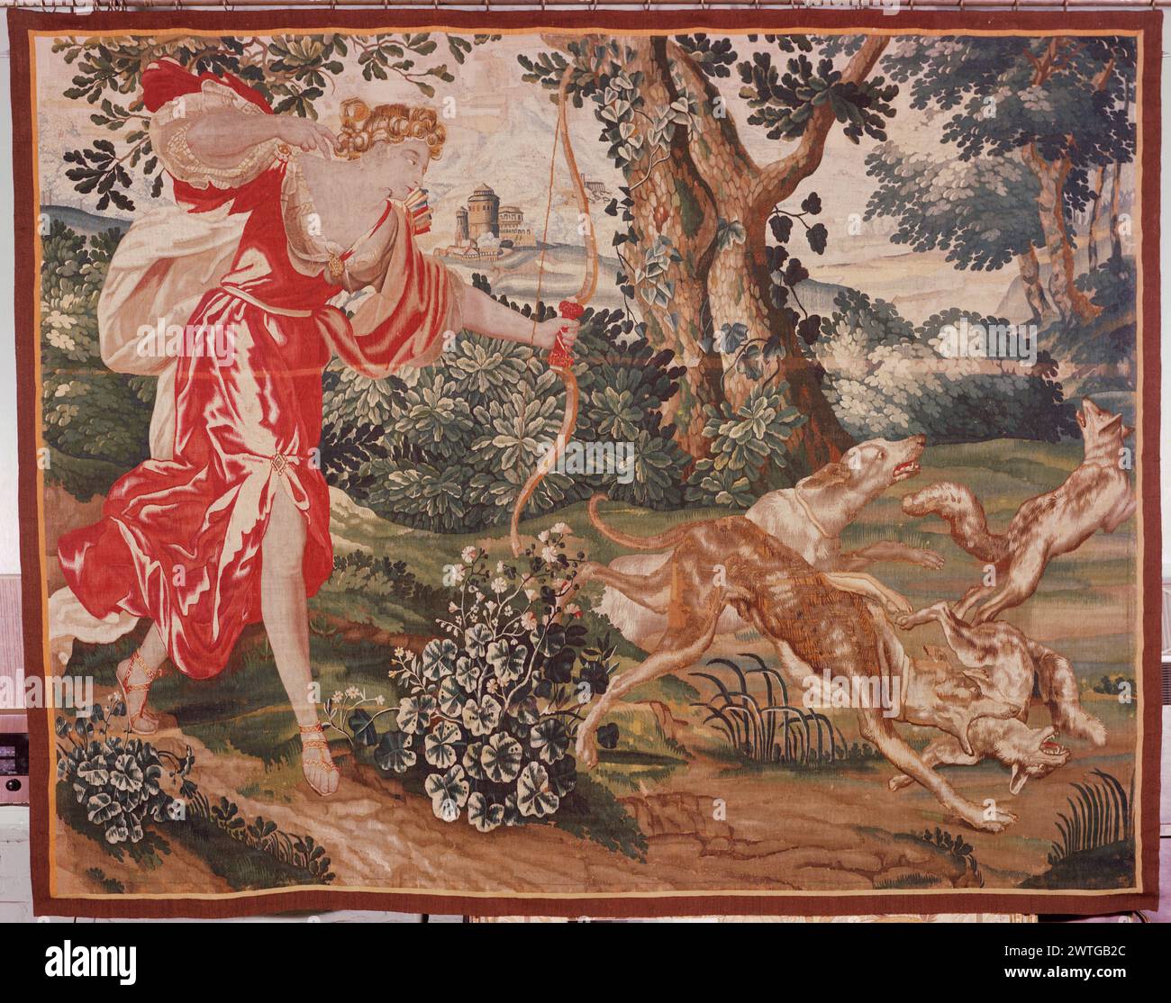 Diana fox hunting. unknown c. 1680-1700 Tapestry Dimensions: H 7'3' x W 9'3' Tapestry Materials/Techniques: unknown Culture: Flemish Weaving Center: Brussels Ownership History: French & Co. purchased from Judson Borglum 12/10/1912; sold to Trinity University 6/11/1964. [SS 9643]. French & Co. purchased from Jeffords W. N. 5/31/1918 [note on SS saying transferred to consignment 9643] [SS 4891]. United States, Texas, San Antonio, Ruth Taylor Art Gallery. In forest, Diana with her hunting dogs, aims her bow at fox (center, foreground); cityscape (L of center, background) Borders missing. French & Stock Photo