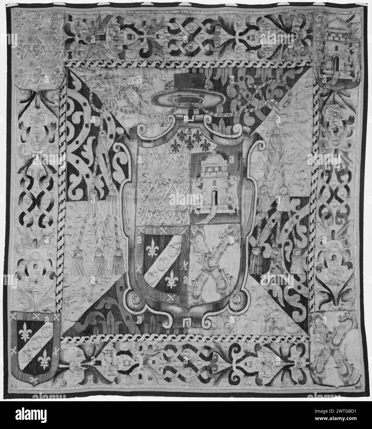 Quartered coat of arms of a bishop. unknown c. 1550-1600 Tapestry Dimensions: H 8'4' x W 7'10' Tapestry Materials/Techniques: unknown Culture: Flemish Weaving Center: unknown Ownership History: French & Co. Coat of arms in strapwork cartouche on patterned field with 8 triangular compartments (BRD) ribbon interlace with floral terminals; coats of arms in corners Curtain. The stock sheet does not indicate from whom tapestry was received from nor to whom it was sold to. French & Co. stock sheet in archive, D-50 Stock Photo
