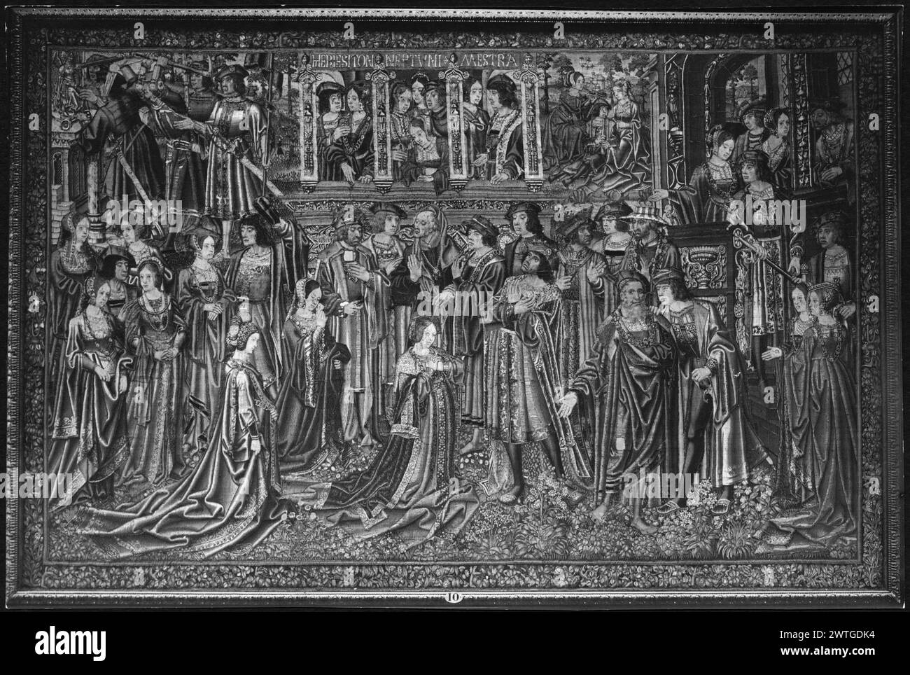 Supplication of Mestra. unknown c. 1515-1520 Tapestry Dimensions: H 359 x W 562 cm Tapestry Materials/Techniques: unknown Culture: Southern Netherlands Ownership History: Somzée coll. Sold to the Musées Royaux des Beaux-Arts de Belgique in 1904. Housed at the Palais Royal de Bruxelles since 1935. Belgium, Brabant, Brussels, Musées royaux des beaux-arts de belgique, accno. 5049. Inscriptions: Inscription in central field, top: HIERESITON.NEPTUNI.MESTRA Mestra, kneeling with hands joined & surrounded by spectators, entreats her father, Erysichthon (R) not to sell her; or entreats Neptune (Poseid Stock Photo