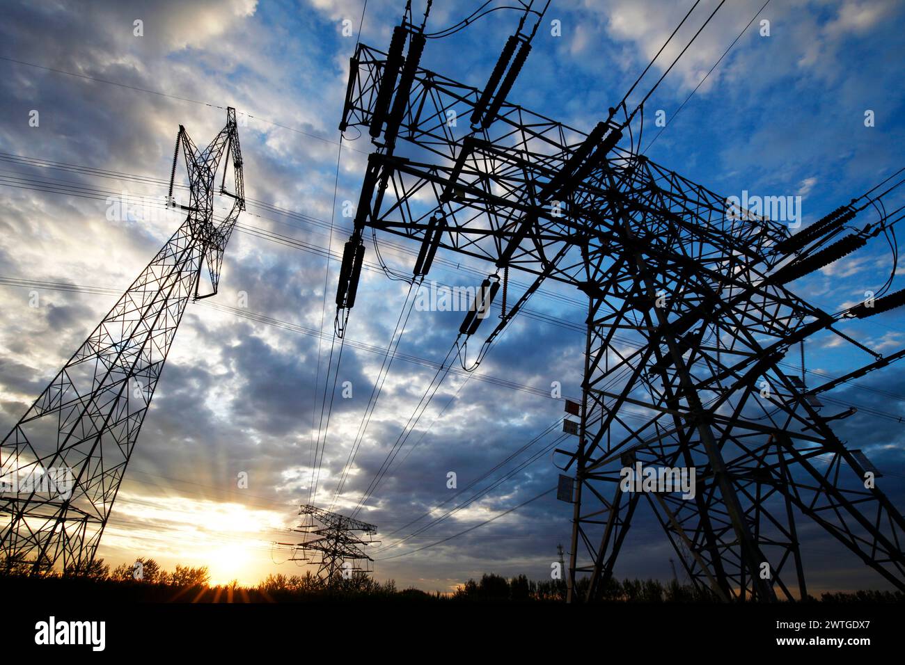 High voltage electric tower line Stock Photo - Alamy