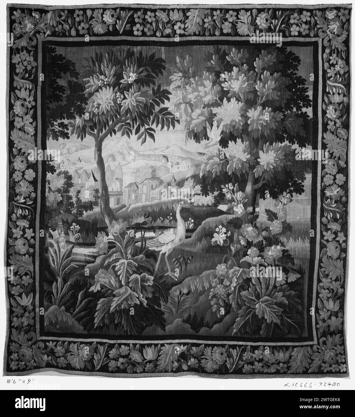 Landscape with large bird. unknown c. 1700-1740 Tapestry Dimensions: H 9' x W 8'6' Tapestry Materials/Techniques: unknown Culture: French Weaving Center: Aubusson Ownership History: French & Co. purchased from Mrs. W. T. Hoops, invoiced 8/20/1928; sold to Mrs. A. B. Spreckels 8/19/1930 [SS 32480]. French & Co. received from Mr. R. Walsh, invoiced 3/12/1932; returned 10/5/1932 [ss 17546]. Bird in center amongst wild flowers, plants & trees; river flows, leading to town on opposite bank; additional buildings on nearby hills in distance (BRD) border with spiraling acanthus leaves & floral decorat Stock Photo