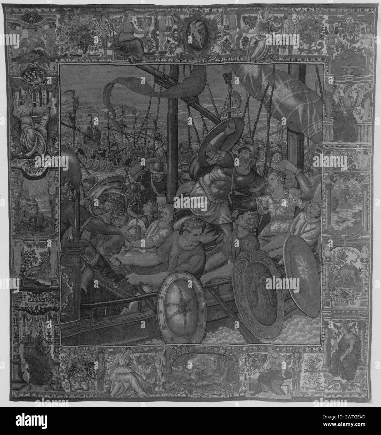 Battle of Actium. unknown c. 1575-1625 Tapestry Dimensions: H 11'2.5' x W 10'8' Tapestry Materials/Techniques: unknown Culture: Flemish Weaving Center: unknown Ownership History: French & Co. Antony wearing helmet, stands up in boat with Cleopatra seated next to him, several men row boat; other boats on water (BRD) grotesques with figures standing & seated beneath miniature architectural frameworks, interspersed with landscape scenes with animals; (UPR BRD) central cartouche with cherub; (LWR BRD) central cartouche with figure in landscape No French & Co. stock sheet in archive, no stock numbe Stock Photo