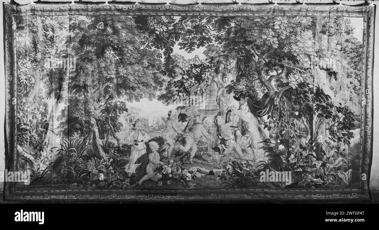 Children playing in garden park. unknown c. 1700 Tapestry Dimensions: H 8'11' x W 16'8' Tapestry Materials/Techniques: unknown Culture: Flemish Weaving Center: unknown Ownership History: French & Co. received from Mrs. Shirley Ford, received 3/20/1946; returned 9/24/1957. Children dancing as 1 plays horns next to architectural ruin with herm; classical structure in distance (BRD) picture-frame border repeating volute motif French & Co. stock sheet in archive, 77999 Stock Photo