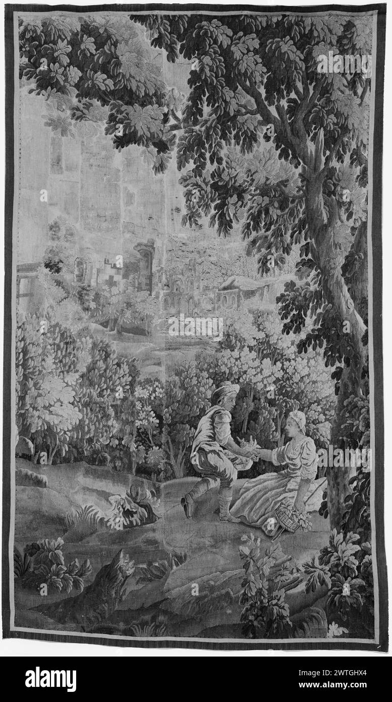 Landscape with fisherman presenting a basket of fish to a shepherdess. unknown c. 1780-1810 Tapestry Dimensions: H 7'9' x W 4'8' Tapestry Materials/Techniques: unknown Culture: French Weaving Center: Aubusson Ownership History: French & Co. purchased from Denver Art Museum, received 12/22/1956; sold to David E. Popper 6/18/1968. In landscape with trees & flowering plants, a fisherman graciously presenting a basket of fish to a shepherdess seated on ground; river with buildings in background Borders missing. French & Co. stock sheet in archive, 57497 Related Works: Compositionally similar tapes Stock Photo