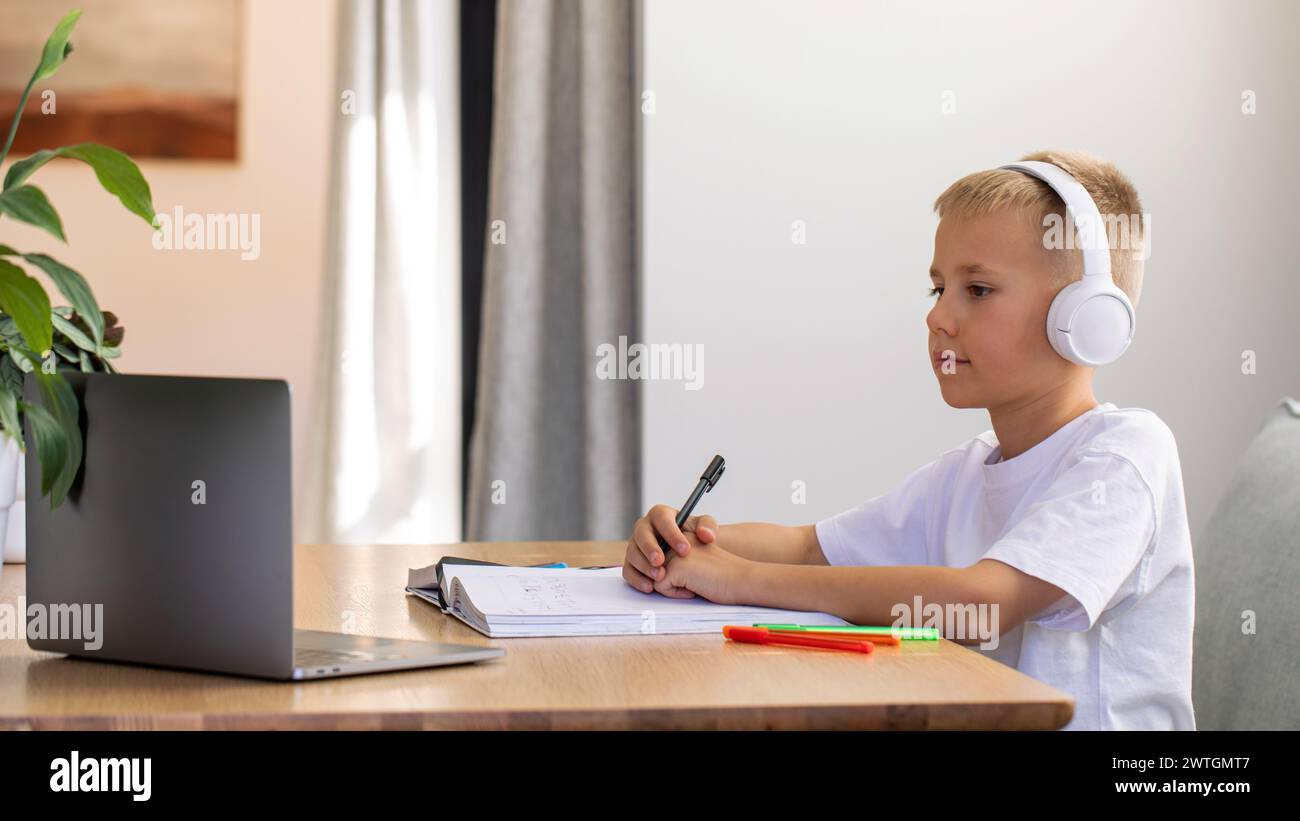 School boy studying online using hi-res stock photography and images ...