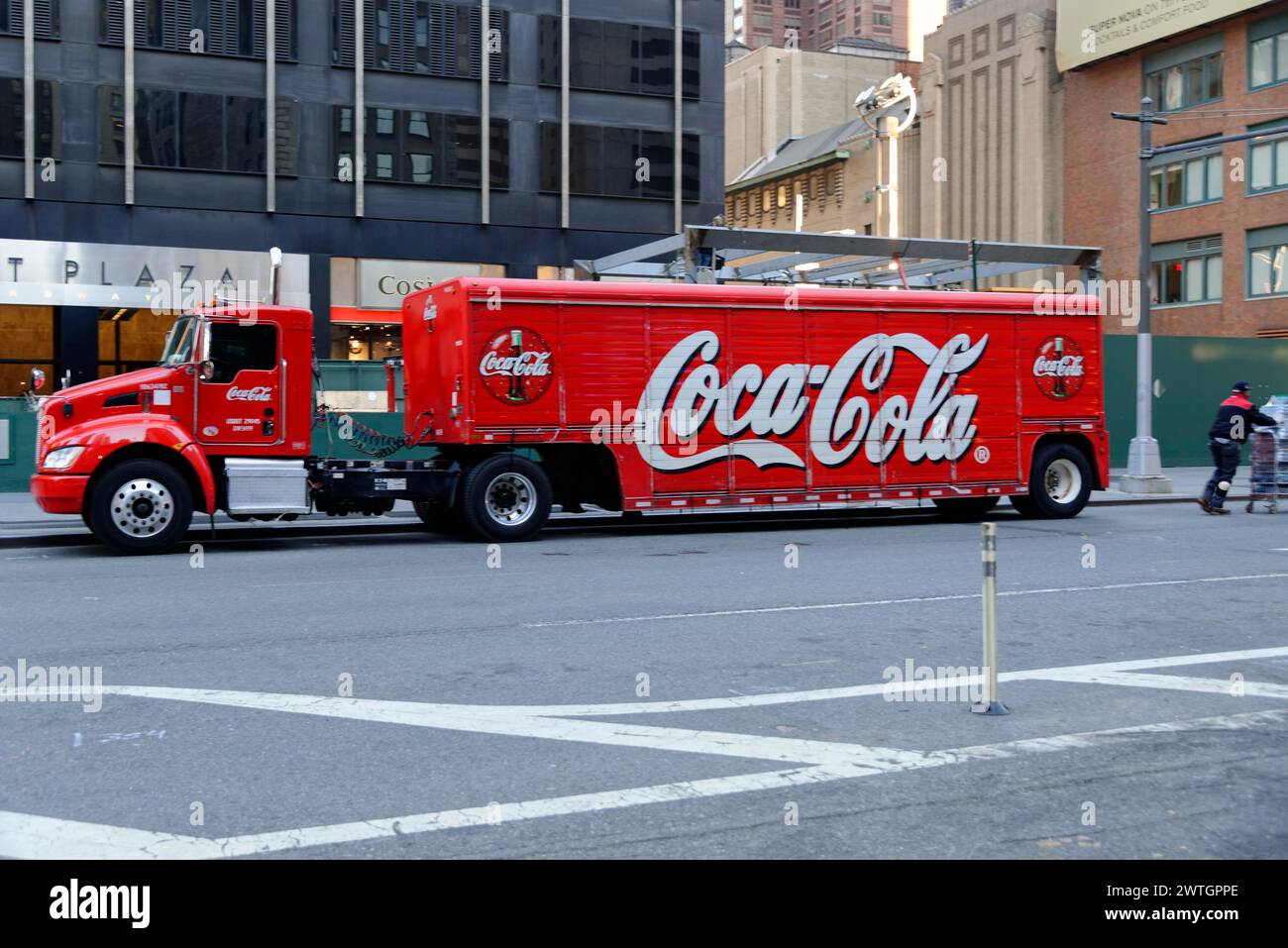 Red Coca-Cola delivery truck driving on a city street, Manhattan, New York City, New York, USA, North America Stock Photo