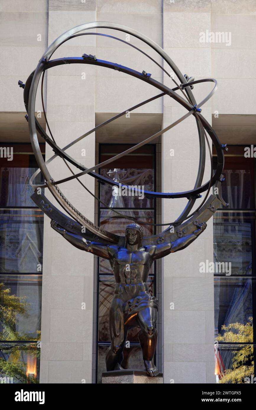 Rockefeller Center, bronze statue of Atlas holding the globe in front of a building, Manhattan, New York City, New York, USA, North America Stock Photo