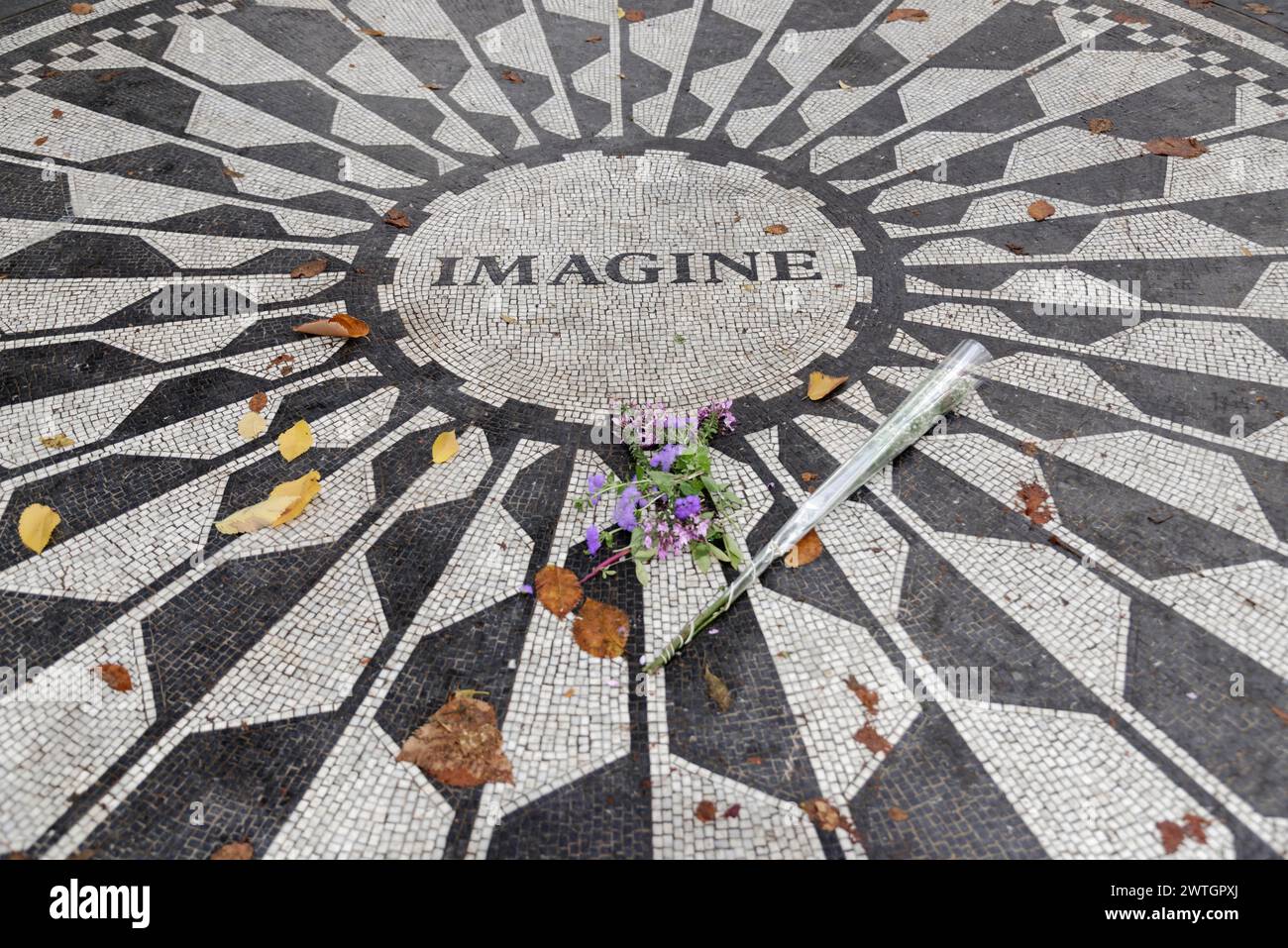 Central Park, A mosaic in honour of John Lennon with the word 'Imagine' and flowers, Manhattan, New York City, New York, USA, North America Stock Photo